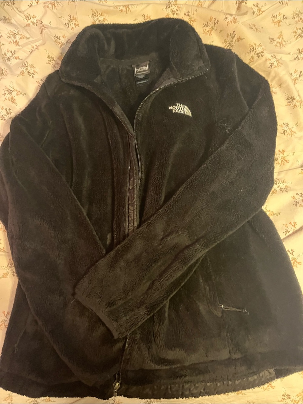 the north face fuzzy black jacket !!